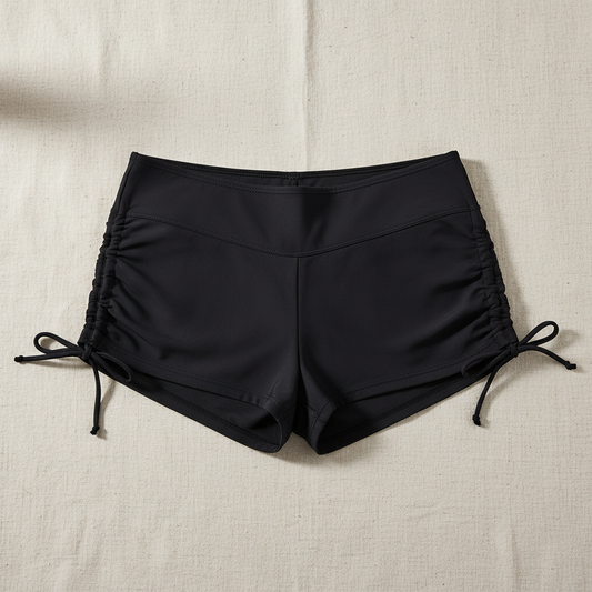 Black Swim Shorts Flat Lay