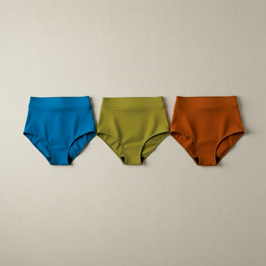Three colorful high-waist briefs flat lay